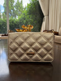 Bolsa pequena crossbody metalassê